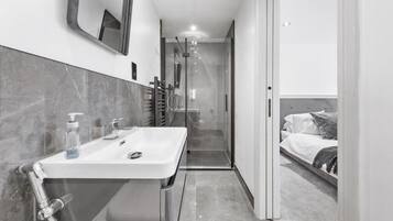 Hair dryer, towels, soap, toilet paper