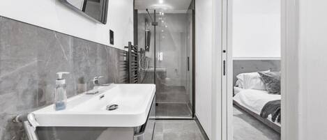 Hair dryer, towels, soap, toilet paper
