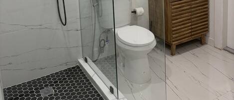 Hair dryer, towels, soap, toilet paper