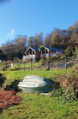 Property grounds - Carrick Chalets - your Highland retreat! Panoramic loch & mountain views. (43CQ+FP Cairndow)