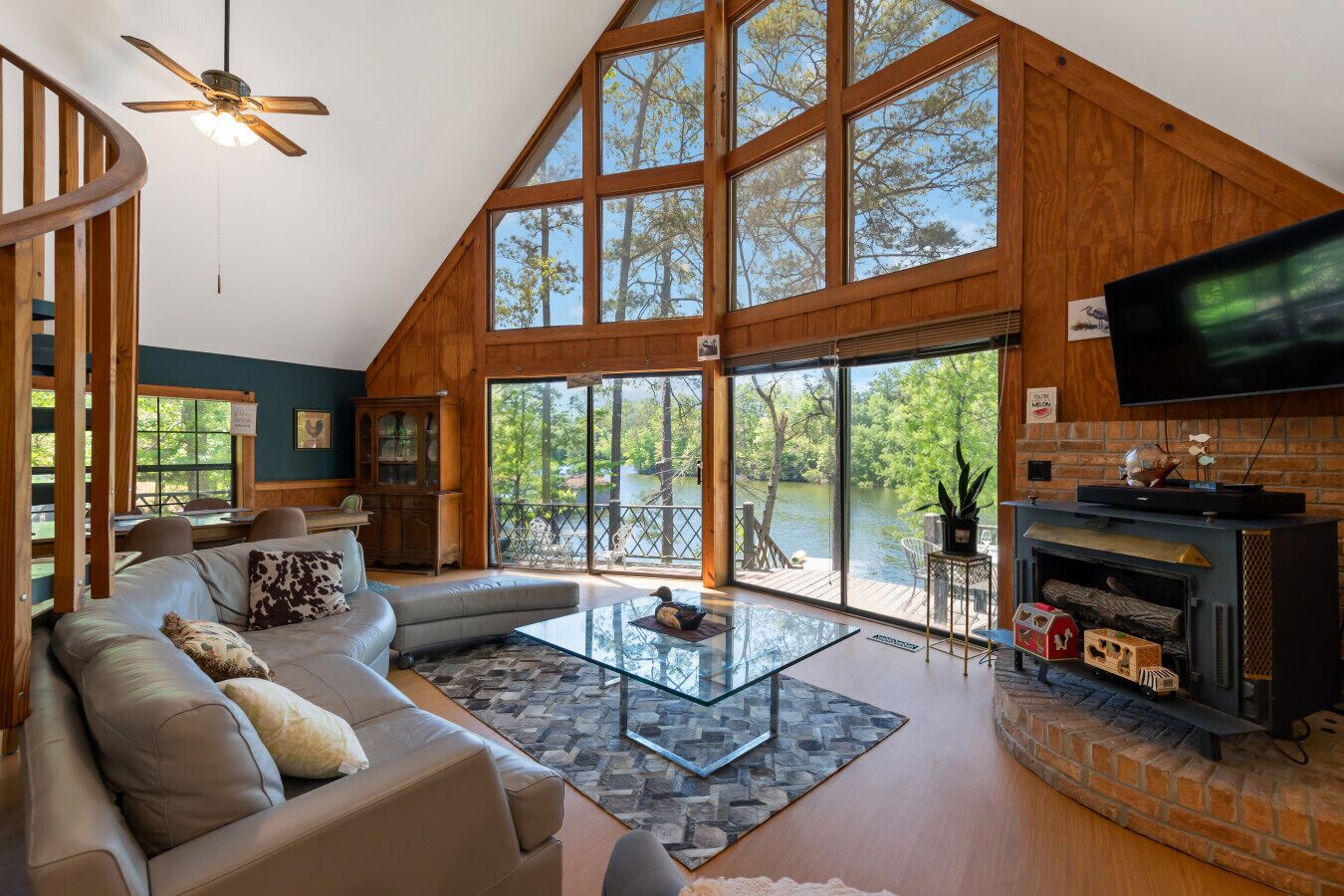 Living Room | Wood Stove Fireplace & TV | Deck Access