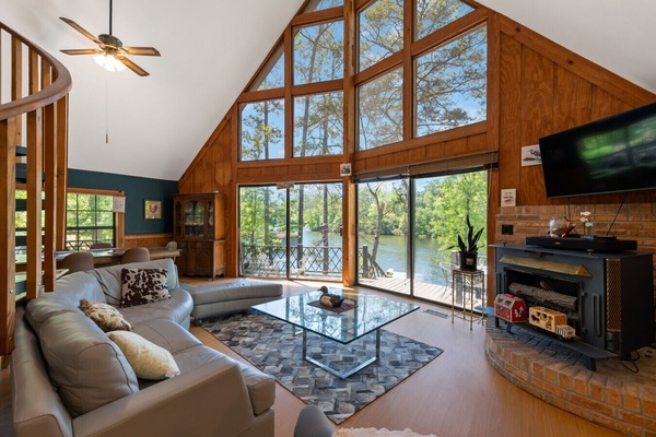 Living Room | Wood Stove Fireplace & TV | Deck Access