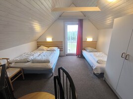 Apartamento Confort, varias camas, cocina, vistas al jardín