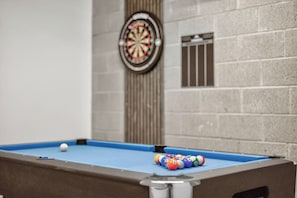 A pool table with a dartboard and billiard balls. - Heddfan (Carmarthen)