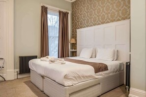Fer et planche à repasser, Wi-Fi gratuit, draps fournis