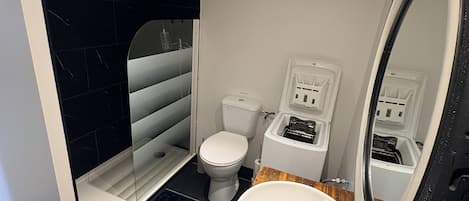 Hair dryer, towels, soap, toilet paper