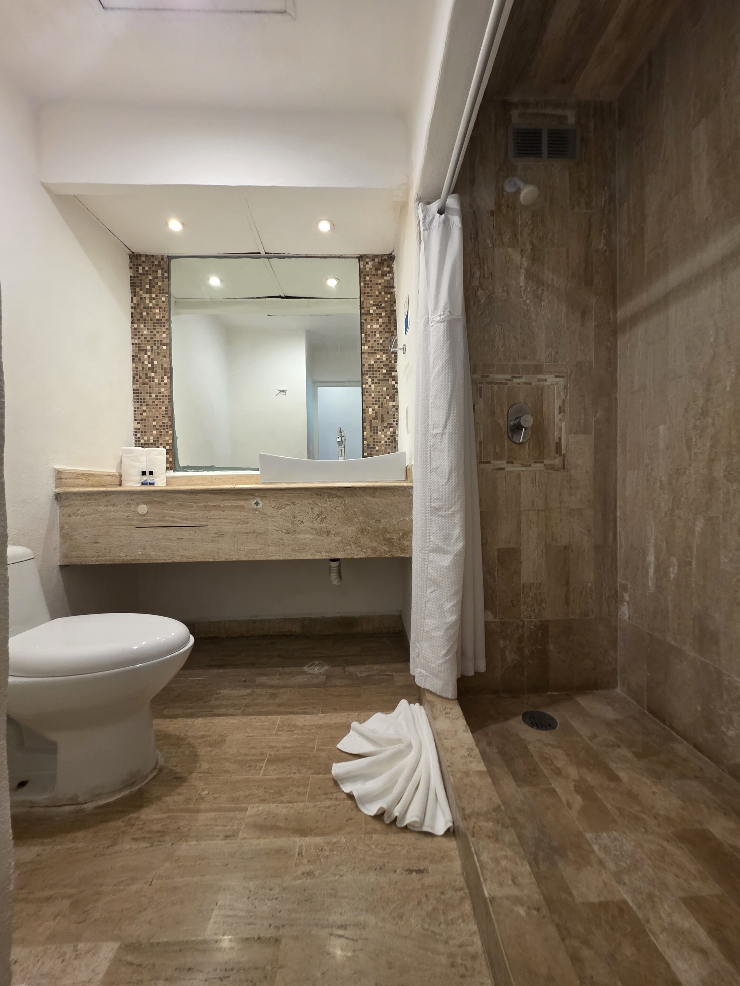Hair dryer, towels, soap, toilet paper