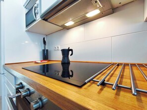 Private kitchen - Beachfront apartment with swimming pool Miami Platja (Miami Platja)