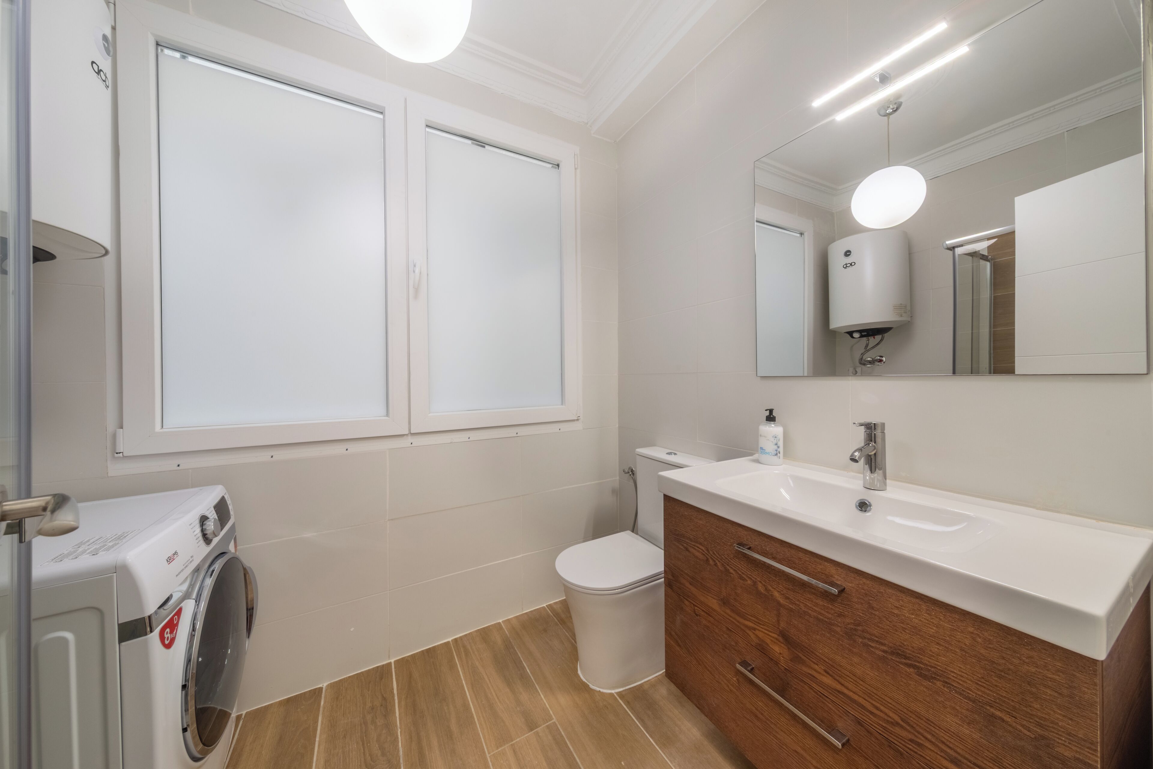 Shower, hair dryer, towels, toilet paper