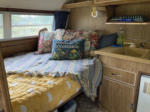 Vintage camper on small farm