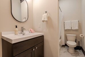 Hair dryer, towels, soap, shampoo