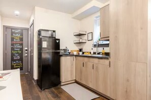 Fridge, microwave, coffee/tea maker, toaster
