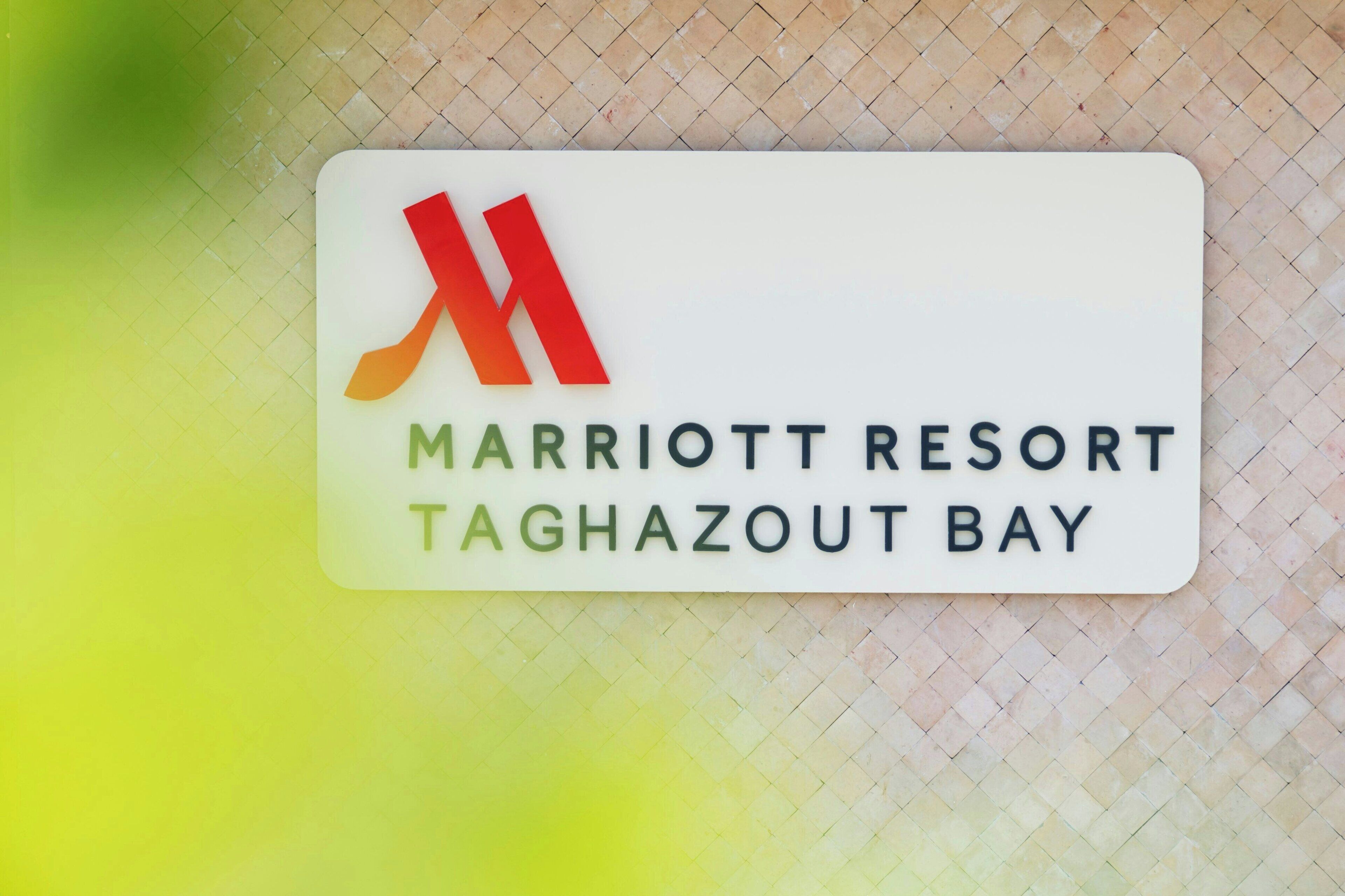 A sign for a Marriott Resort in Taghazout Bay.