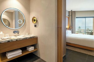 Hair dryer, slippers, towels, shampoo