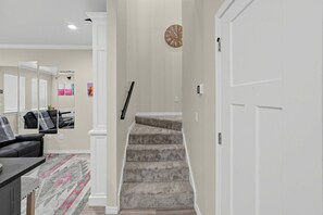 Staircase | Carpeted Steps | Wall Clock - Bright Amarillo Townhome with Yard and Garage (Amarillo)