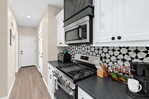 Kitchen | Gas Range | Coffee Station - Bright Amarillo Townhome with Yard and Garage (Amarillo)