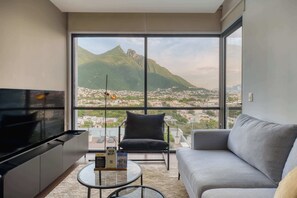 TV, table football, offices - Upscale 1BR Oasis: A/C, Pool & In-Unit Laundry (Monterrey)