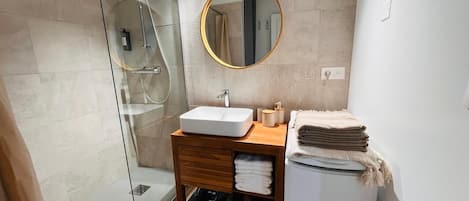 Hair dryer, towels, soap, toilet paper