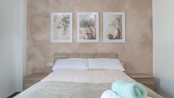 1 slaapkamer, een strijkplank/strijkijzer, wifi, beddengoed
