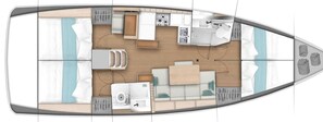 A boat interior with a kitchen, dining area, and a seating area with a view of the water. - Sun-Kissed Sailing Adventure in the Sporades Islands from Volos, Thessaly (Volos)
