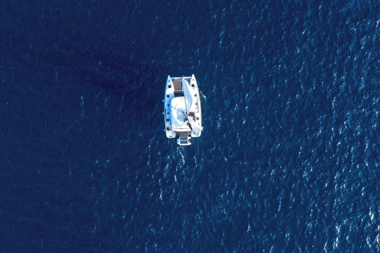 A boat on a vast body of water.