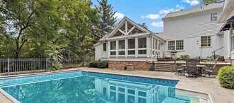 Massive 6 bedroom home, featuring an in-ground pool, located near restaurants.