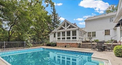 Massive 6 bedroom home, featuring an in-ground pool, located near restaurants.