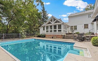 Massive 6 bedroom home, featuring an in-ground pool, located near restaurants.