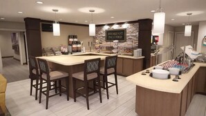 A breakfast bar with a sign stating 'BREAKFAST INCLUDED,' a bar area with stools, and a counter with plates and utensils. - 2BR King Suite w/ Full Kitchen | Fire Pit + Pool (Scottsdale)