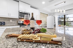 Fridge, microwave, oven, stovetop - Mimosa Days and Game Nights Heated Pool Home (Cape Coral)