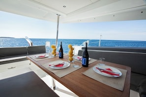 Outdoor dining - Sun-Kissed Sailing Adventure in Islas Sarónicas (Alimos)