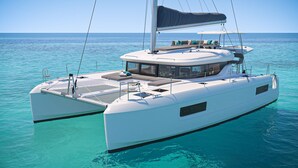 A white catamaran with a covered deck, lounge seating, and a small table. - Sun-Kissed Sailing Adventure in the Sporades Islands from Volos, Thessaly (Volos)