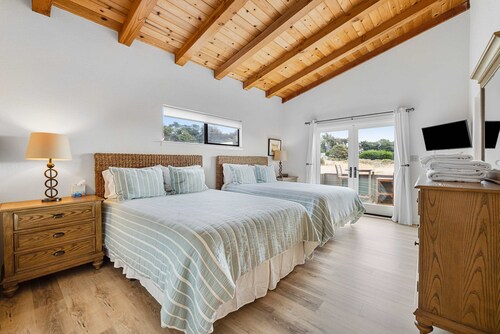 Ocean-view home with private hot tub & grill, dogs welcome