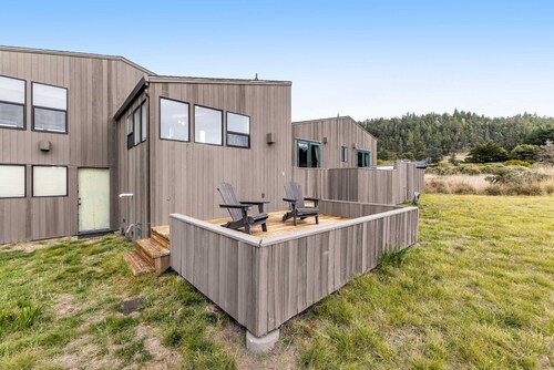 Ocean-view home with private hot tub & grill, dogs welcome