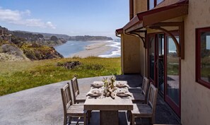 Outdoor dining - Luxury oceanfront home with 270-degree views, hot tub & 2 fireplaces (Gualala)