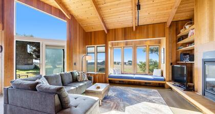 Ocean-view meadow home with hot tub near Walk On Beach, dogs welcome