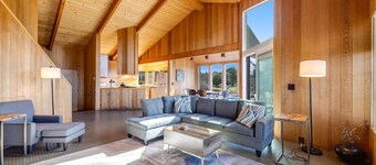 Ocean-view meadow home with hot tub near Walk On Beach, dogs welcome