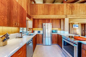 Fridge, microwave, oven, stovetop - Ocean-view home with hot tub & prime location at Shell Beach (Sea Ranch)