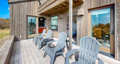 Ocean-view home with hot tub near Walk On Beach, dogs welcome