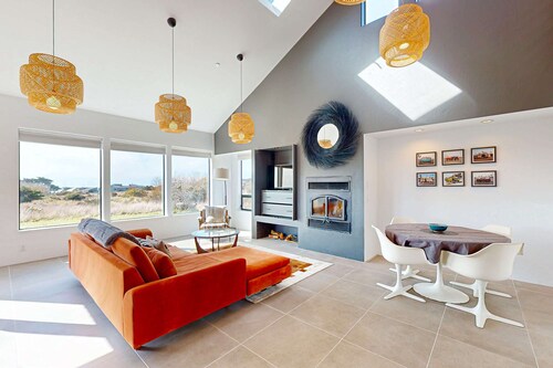 Ocean-view home with hot tub near Walk On Beach, dogs welcome