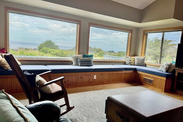Settle into the window seat with your morning coffee — the ocean view does the rest.