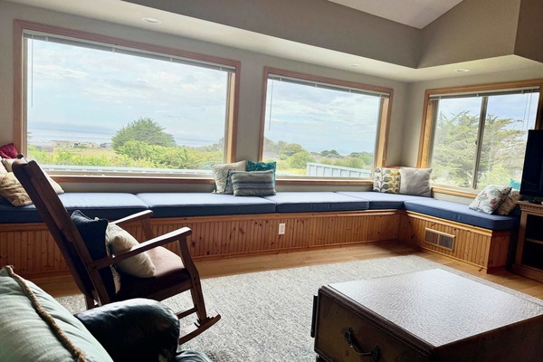 Settle into the window seat with your morning coffee — the ocean view does the rest.