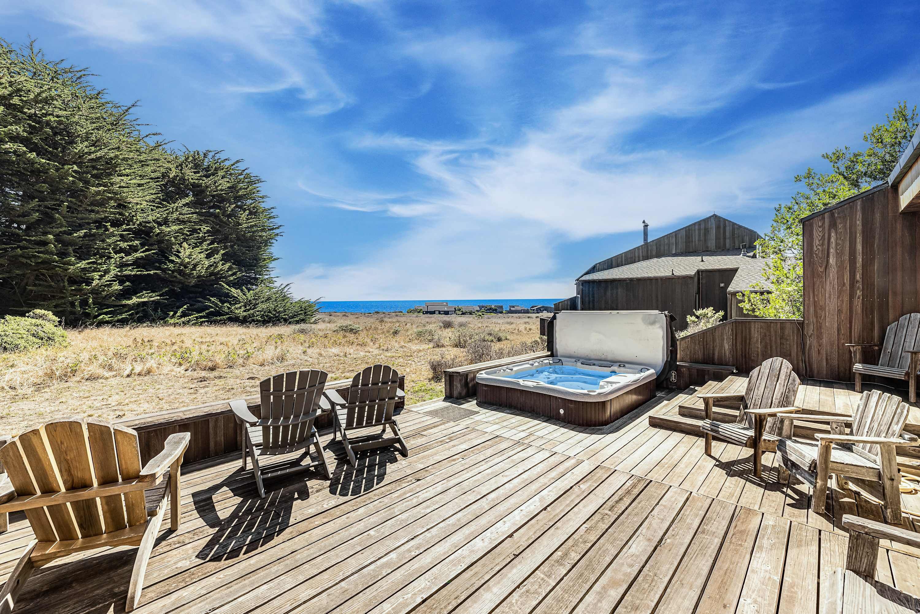 Soak in your private hot tub while gazing at the endless ocean view—perfect for unwinding after a day of adventure.