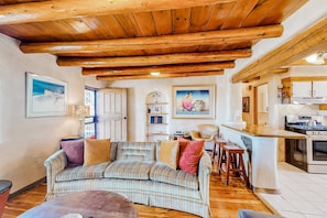 TV, fireplace - Hacienda del Canon - Historic Adobe, Views & Pets (Taos)