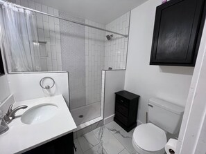 Shower, towels, soap, toilet paper - Midcentury Modern in OKC with the fastest access to anywhere in the metro! (Oklahoma City)