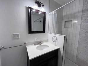 Shower, towels, soap, toilet paper - Midcentury Modern in OKC with the fastest access to anywhere in the metro! (Oklahoma City)