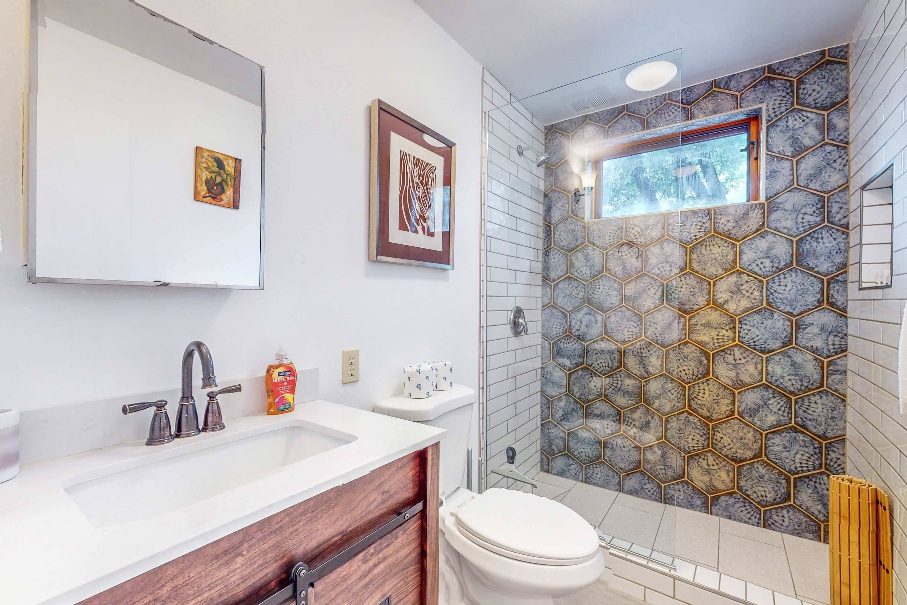 Shower, hair dryer, towels, shampoo