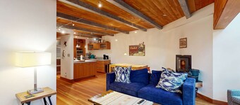 Modern mountain-view getaway w/ fireplace - walk to private ski locker by lifts