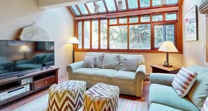 Designer Forest-View Condo with Balcony, Wood Stove & Sunroom - Near Slopes