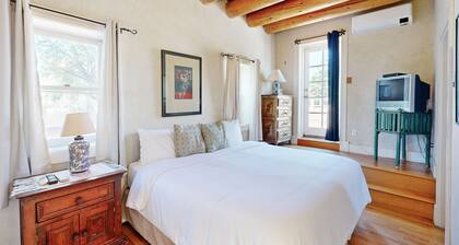 Adobe condo with fireplace, rooftop deck & garden courtyard - near Plaza